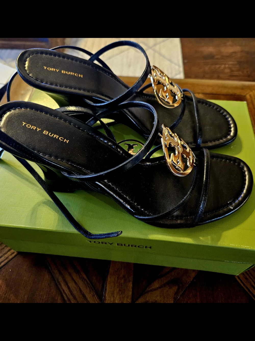 Tory Burch Black Strappy Sandals with Gold Logo Accent